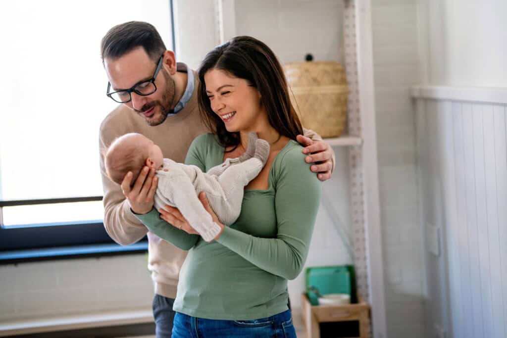 Couple holding a baby