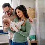 Couple holding a baby