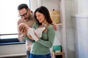 Couple holding a baby