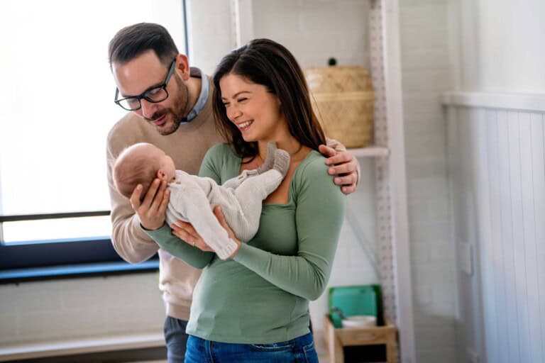 Couple holding a baby